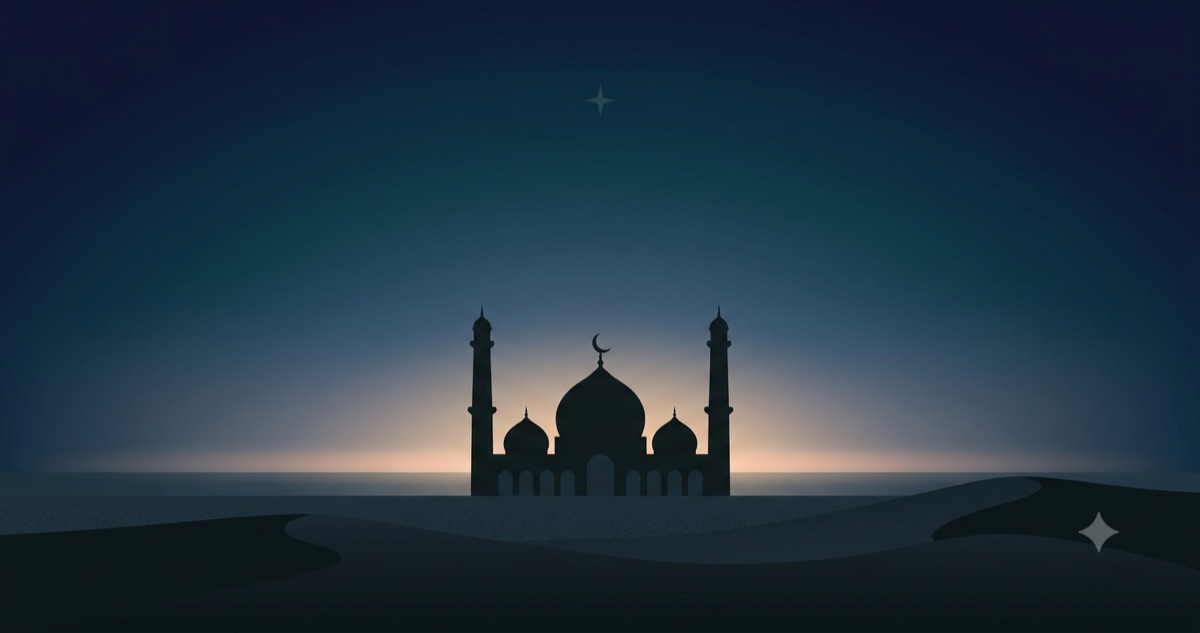When does Fajr start: first light of true dawn over a mosque